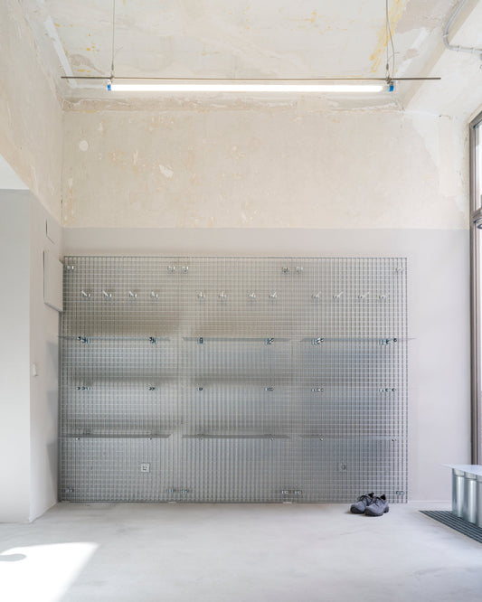 The official retail space of Paracia in Madrid. It blends historical charm with modern functionality. The project began by uncovering the original raw space, removing false ceilings and claddings to reveal the building's authentic character. 