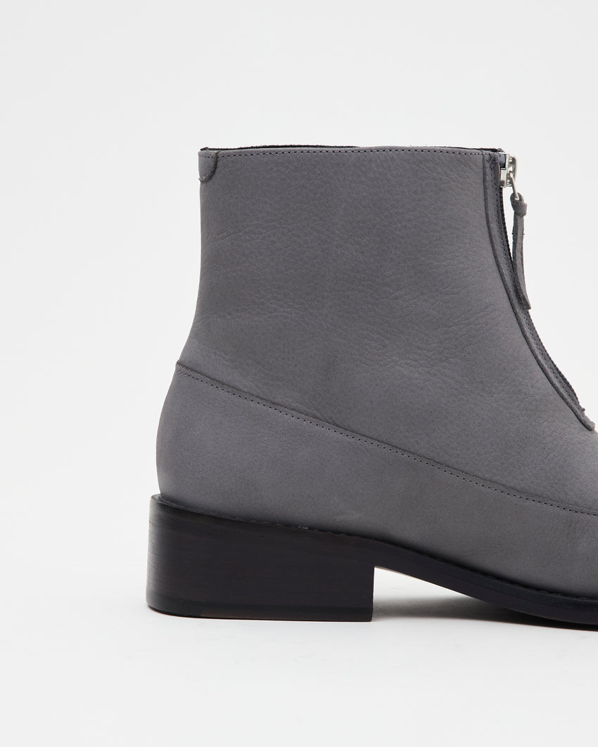 Side profile close-up of a single Cove Boot Nubuck Ink Blue boot