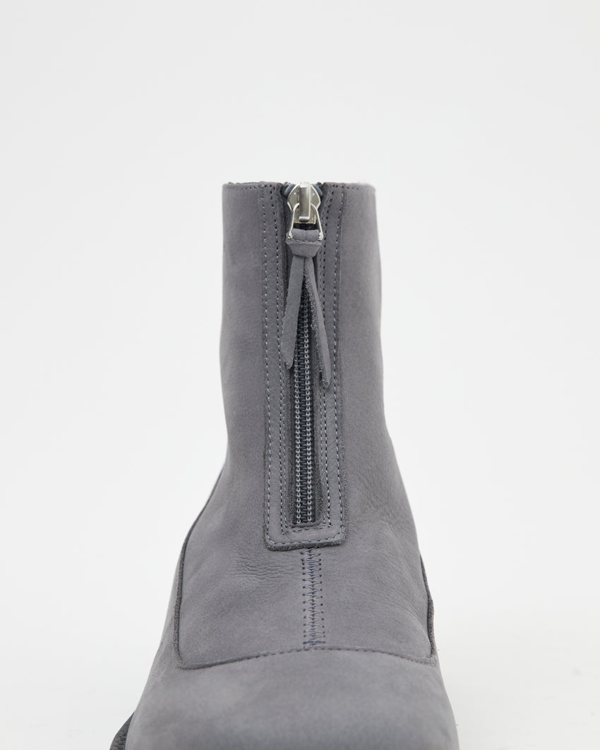 Close-up front view of a single Cove Boot Nubuck Ink Blue boot showing zipper