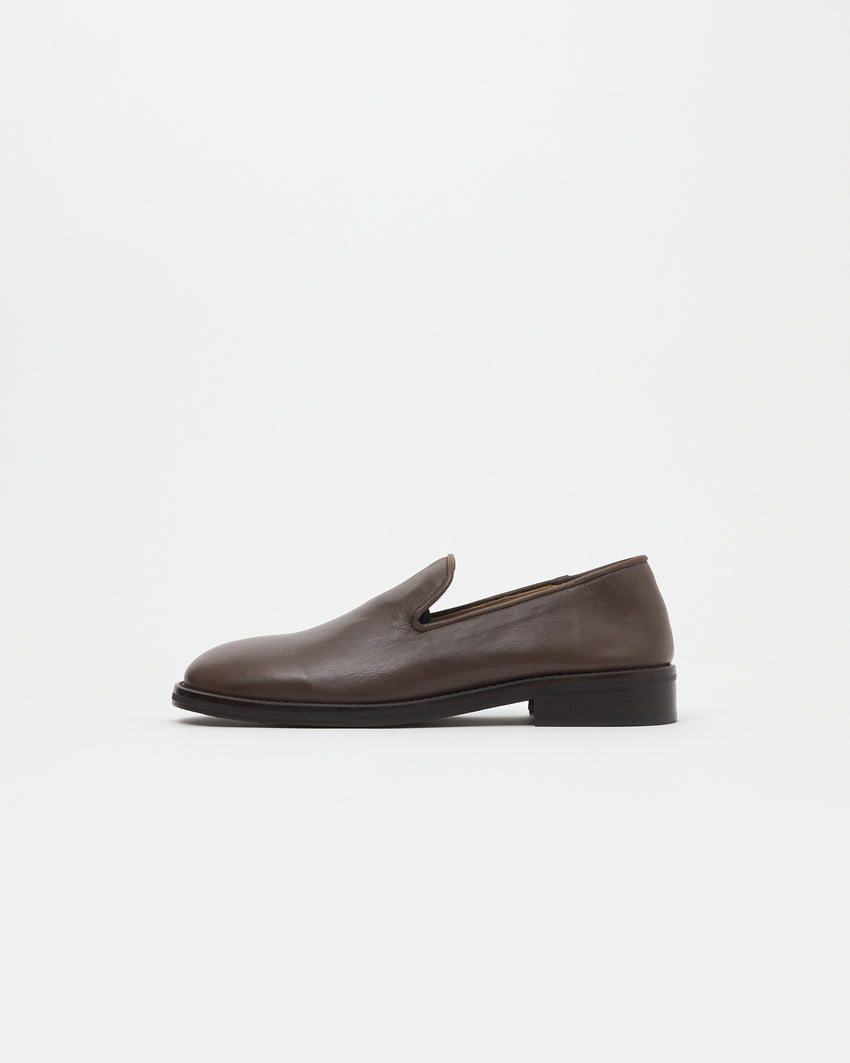 Side profile of Legacy Slipper in brown oil nappa leather by Paracia.