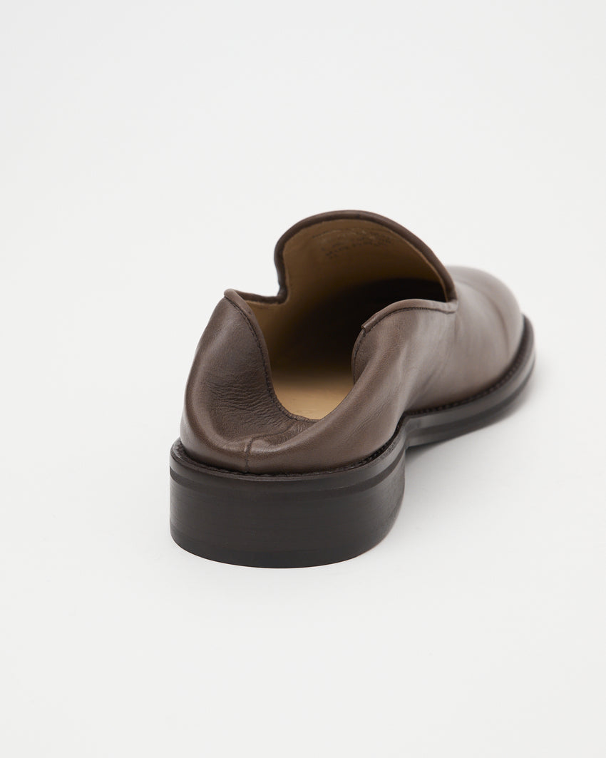 Rear close up view of Legacy Slipper in brown oil nappa leather, showing collapsable heel, by Paracia.