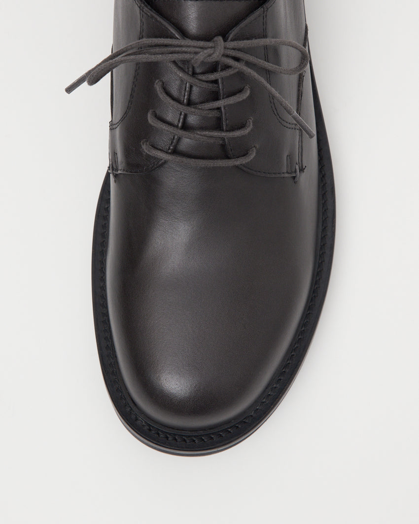 Top-down view of Mid-Heel Derby in dark grey oil nappa leather laces and toe box.