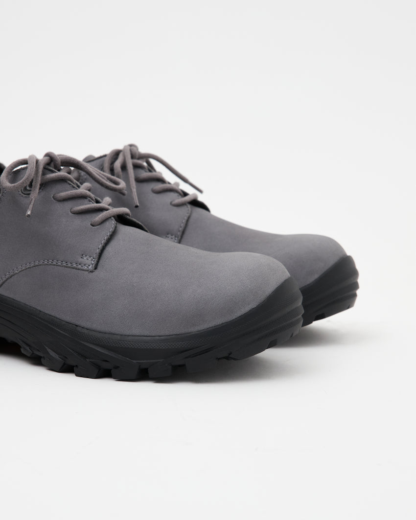 Close-up top-down view of a single Non-Safety Shoe Nubuck Ink Blue shoe showing laces