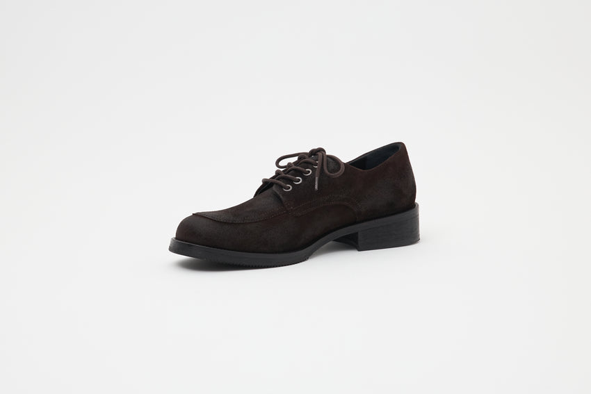 Small side profile view of a single Old Buster Waxed Suede Deep Brown shoe